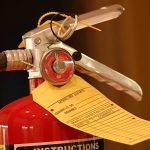 Mobile Fire Services fire extinguisher with a blank inspection tag